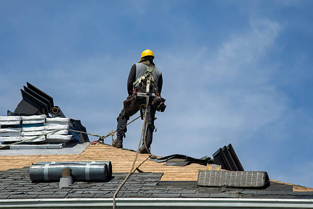 Professional Roofing technician working in Manchester, NY